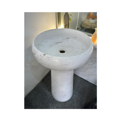 Okrągła umywalka z białego marmuru